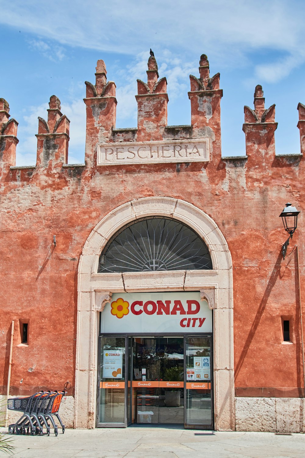 brown brick building with glass window